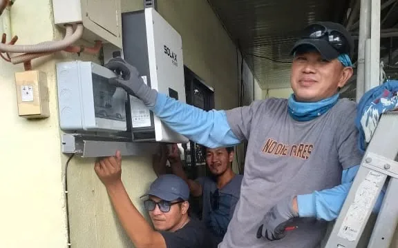 STS technicians at an inverter installation